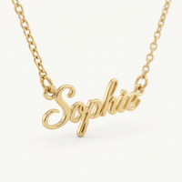 Gold cursive nameplate close-up